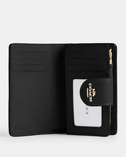 Coach Mila Small Flap Wallet – Signature Canvas Negra