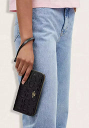 Coach Monedero Wristlet en Charol Negro