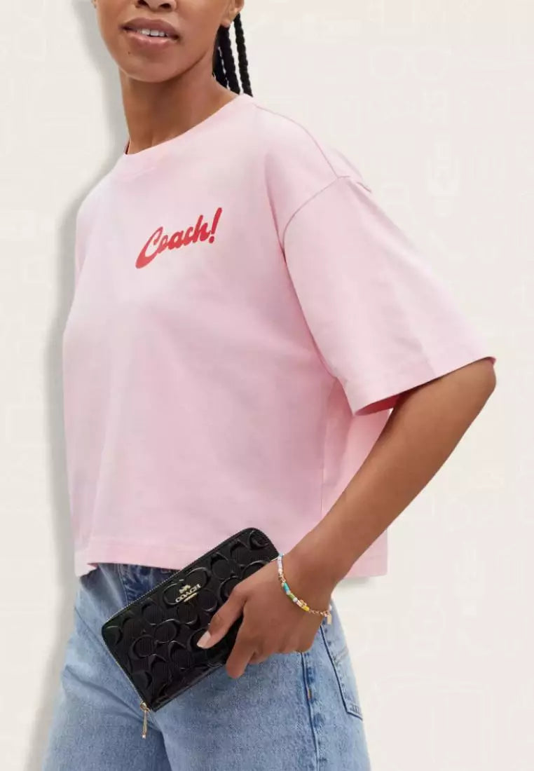 Coach Monedero Wristlet en Charol Negro