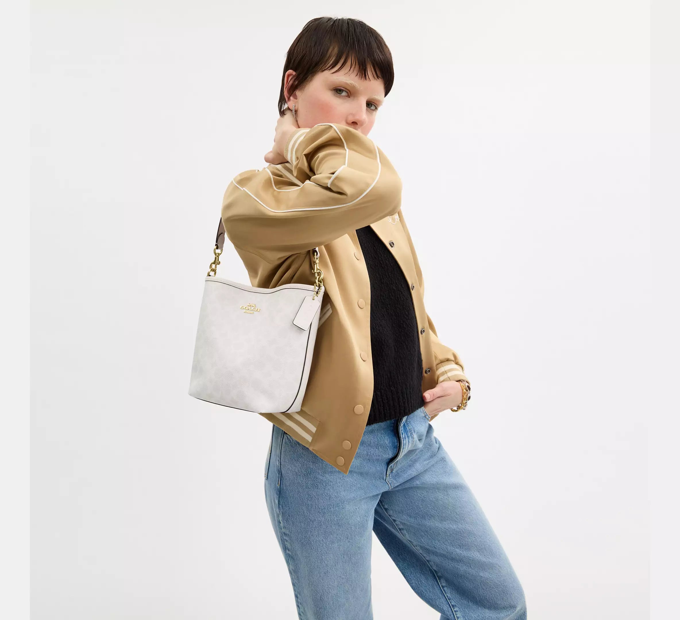 Coach bucket City Small en lona de firma Blanca