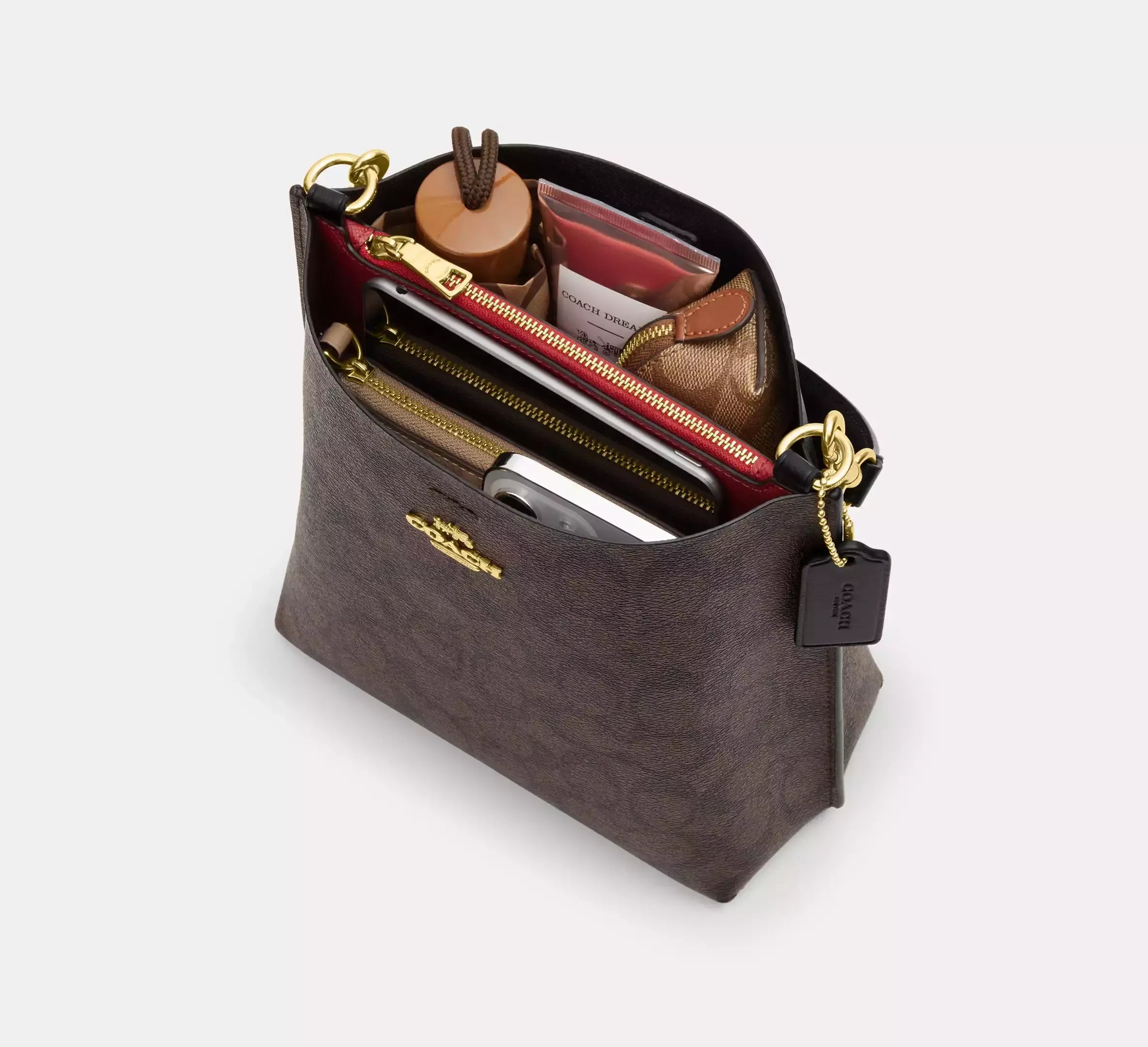 Coach Bucket Mollie Signature Marrón