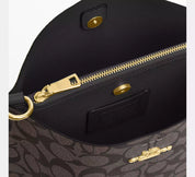 Coach Bucket Mollie Signature Marrón